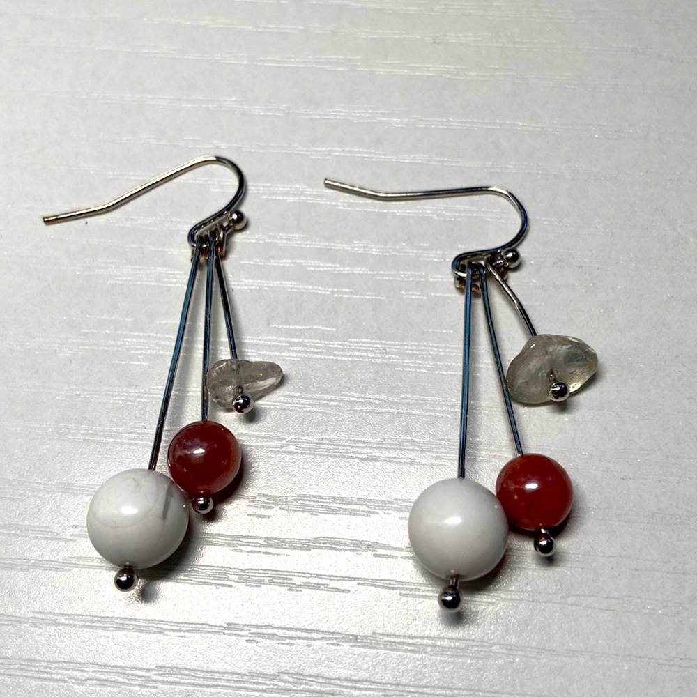 Handmade howlite, sun stone and rhodonite.